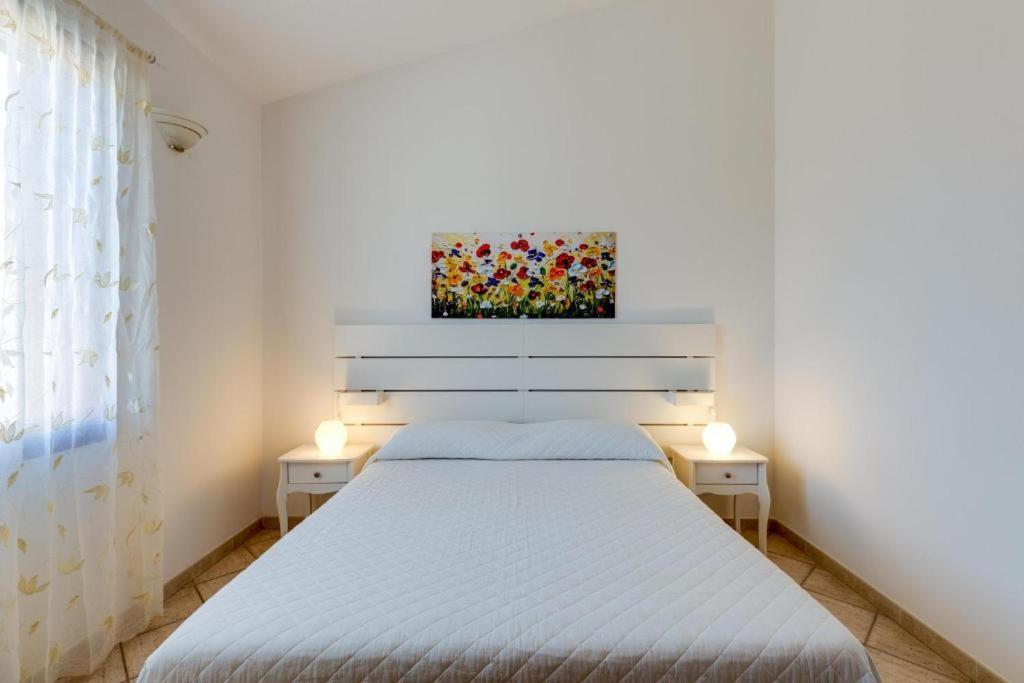 La Casa Delle Zie - Cabras Villa Bagian luar foto